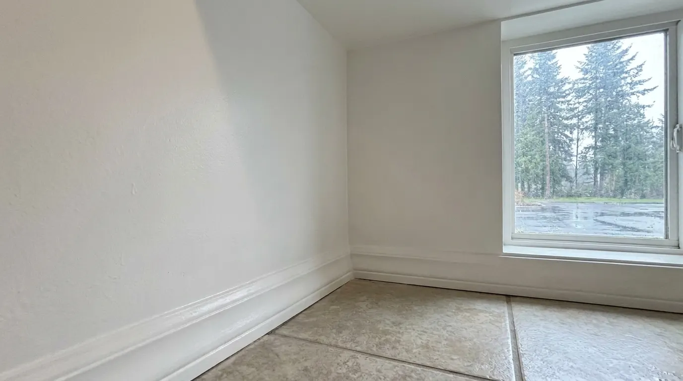 Same bathroom wall clean and repainted after mold remediation